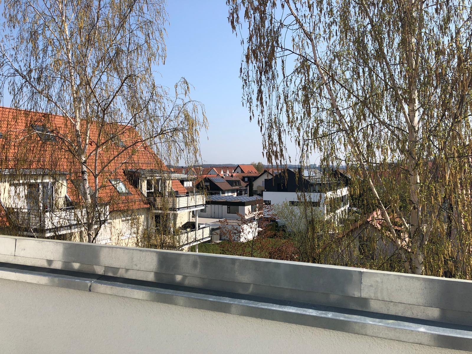 Blick über Wohndächer und Bäume in der Region Sindelfingen